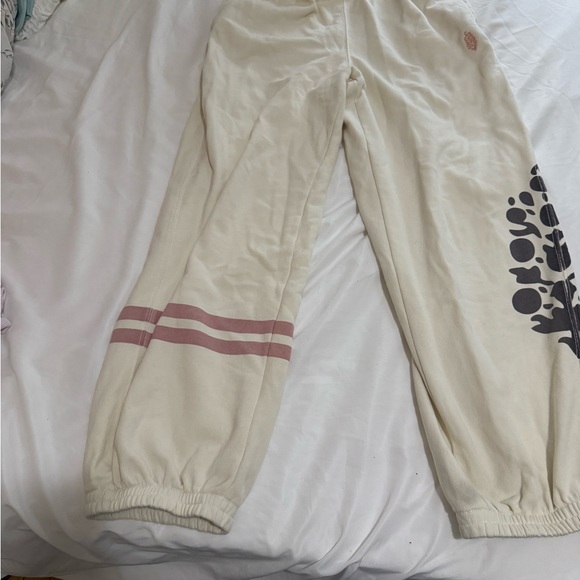 Free People Movement All Star Logo Pants in a cream color. - Picture 7 of 9